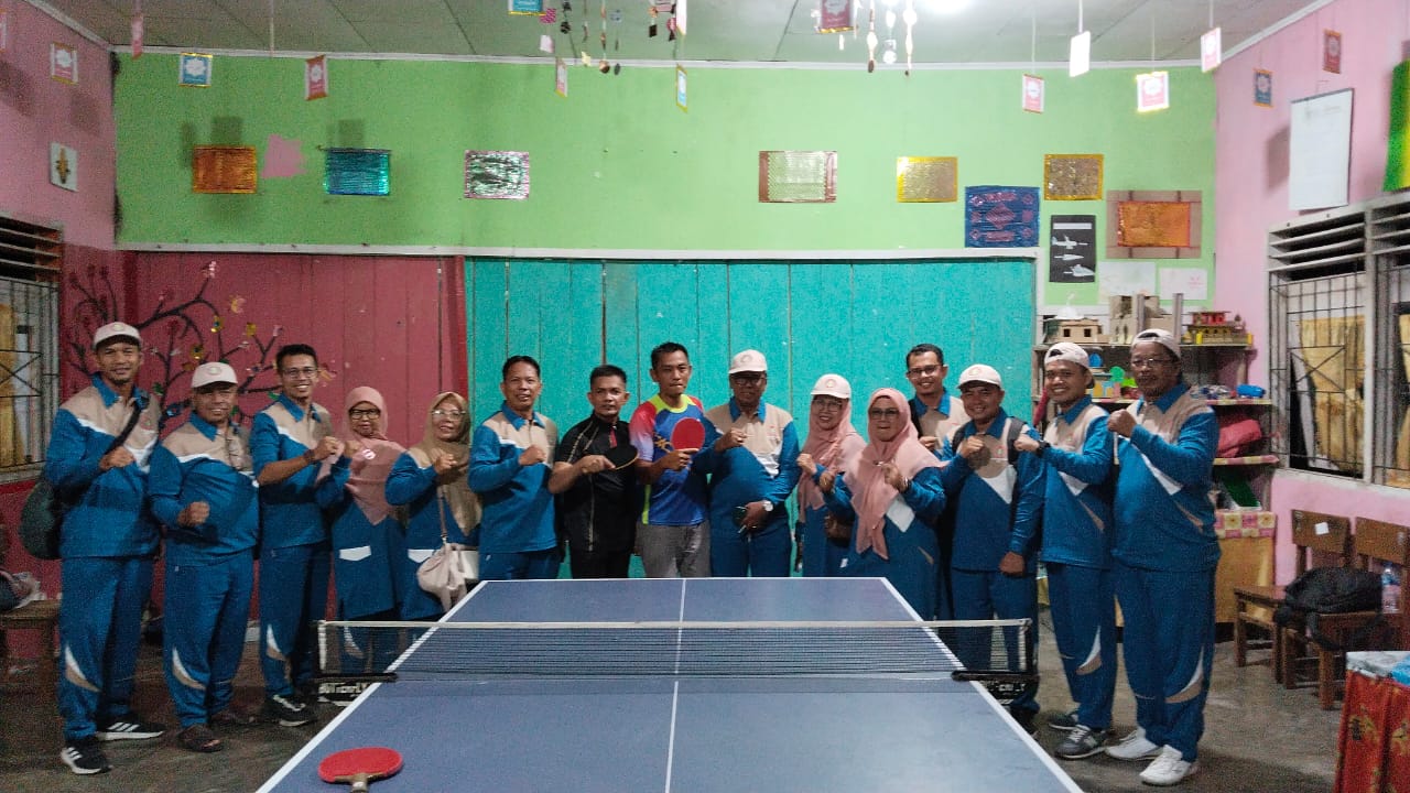 Juara 1 Tennis Meja Ganda Putra Tingkat Kabupaten Agam pada Peringatan HUT PGRI ke - 80